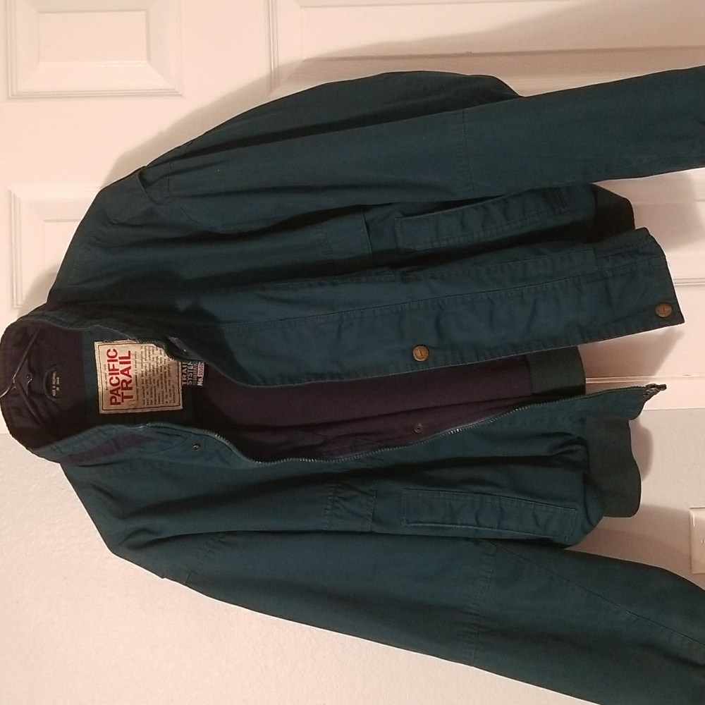 Pacific trail windbreaker jacket. Fleece lined. Size Large. Green and navy blue.